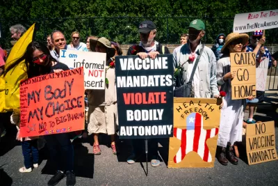 A group of protestors oppose mandatory vaccinations during the Covid-19 pandemic.