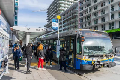 Bus stop in Richmond, British Columbia with passengers boarding.