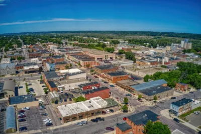 Aerial view of central New Ulm, Minnesota, small German-inspired town with brick buildings.
