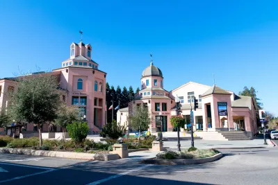 Pink Spanish-style building for Mountain View City Hall in Mountain View, California.