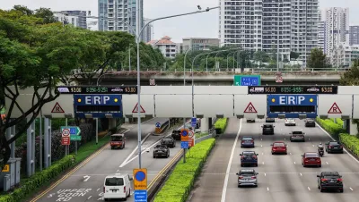 Multilane roadway in Singapore with congestion pricing gate.