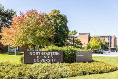 Sign for Northeastern Illinois University at front of campus in Chicago, Illinois.