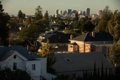 View of homes and Alameda, California skyline in background