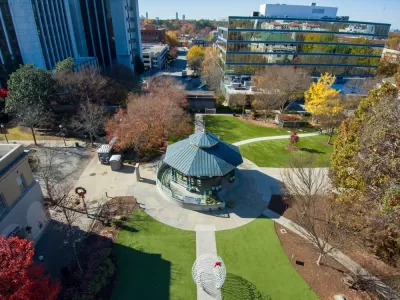 Aerial view of gazebo and surrounding lawn and buildings in Decatur Square, Decatur, Georgia