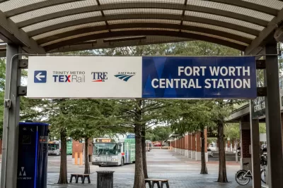 "Fort Worth Central Station" sign on platform at train station