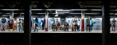 People on a New York City subway platform.