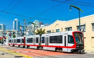 A San Francisco tram in front of tall buildings