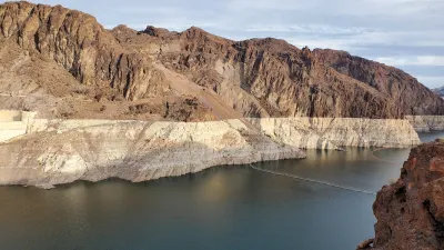 A photo of the Colorado River that shows it is many feet lower than it used to be.