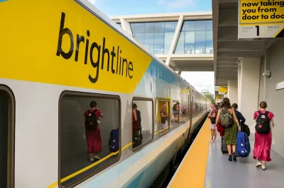 People board a bright line Florida train. 