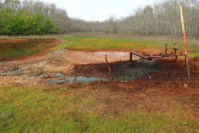 A leaking oil well in Texas contaminates a field.