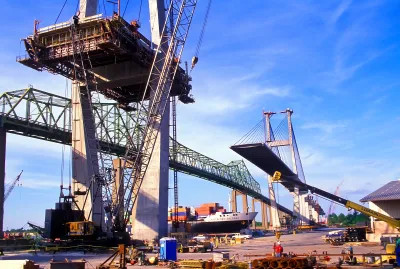 Tall bridge or overpass under construction.