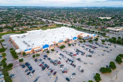 Aerial of large Walmart parking lot in Frisco, Texas.