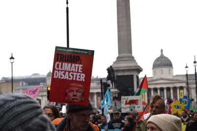 Anti-Trump signs at climate change protest in London, UK.