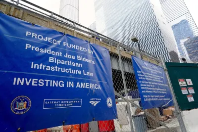 Blue sign with white text for New York City Gateway Tunnel project.