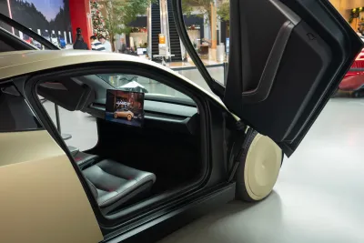 Gold Tesla Cybercab prototype being shown in showroom in Bellevue, Washington.