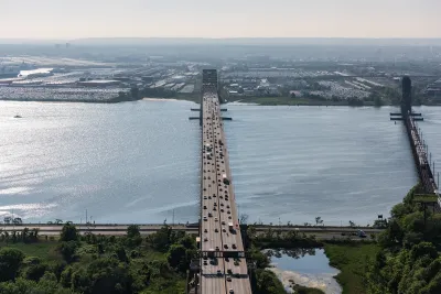 Aerial view of Newark Bay Bridge with light traffic.