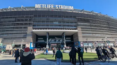 Fans walking into MetLife stadium in East Rutherford, New Jersey.