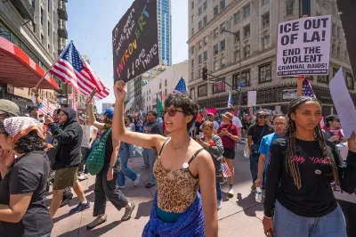 Large group of protesters in Los Angeles protesting ICE raids in June 2025.