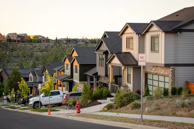 Two-story homes with driveways on small street in Bend, Oregon.