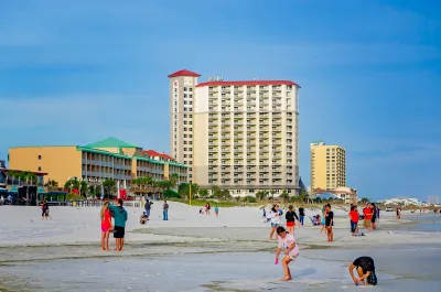 People relax on Pensacola Beach.