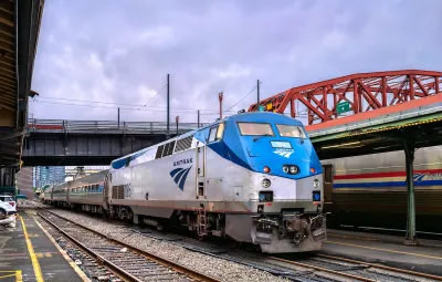 An Amtrak train pulls into a station in Portland.