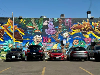 Colorful mural in Denver parking lot.