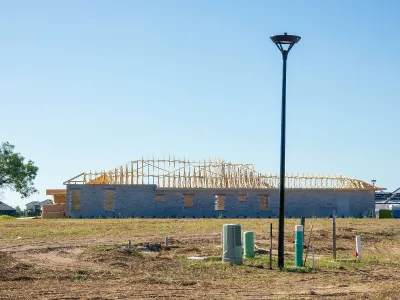 Half-built wood frame home.