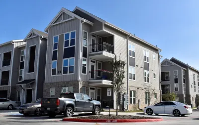 Three-story modern apartment buildings in Houston, Texas.