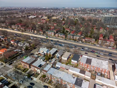 A dense neighborhood, with the long island expressway running through it.