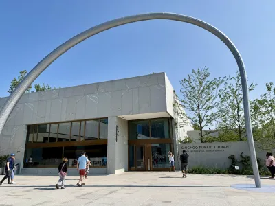 Visitors view the Obama Presidential Branch of the Chicago Public Library on the campus of the Obama Presidential Center