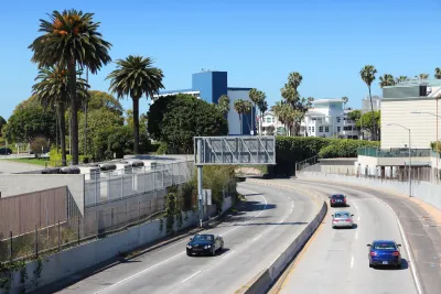 A few cars on the I-10 interstate freeway in Santa Monica, California.