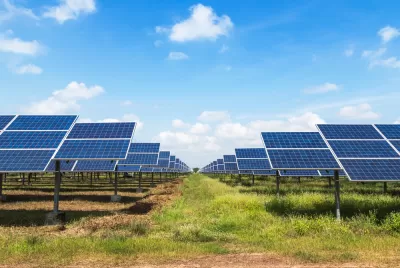 Solar panels in a green field