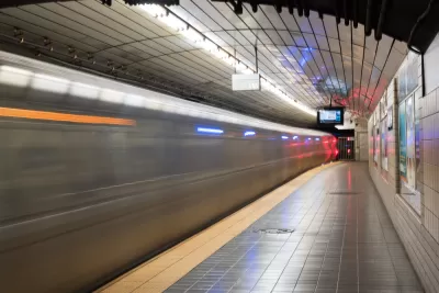 Jersey City, NJ - November 13, 2016: Train passing through the Exchange Place PATH station located at Exchange Place in Jersey City, New Jersey, adjacent to the Hudson River at Paulus Hook.