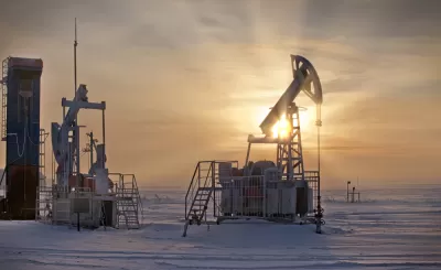 Oil extraction pumps in winter landscape in Russia
