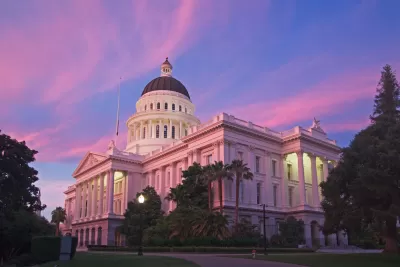 California state capitol building against purple and blue sunset sky