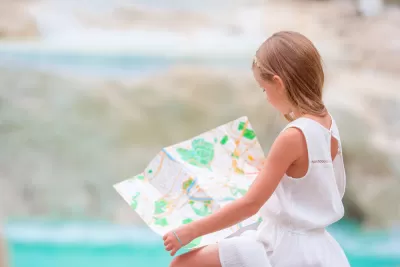 Kid with map