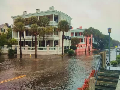 Flooded street with historic home in Charleston, South Carolina