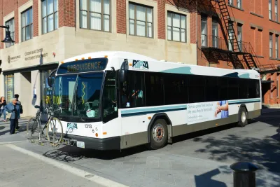 White Rhode Island RIPTA transit bus.