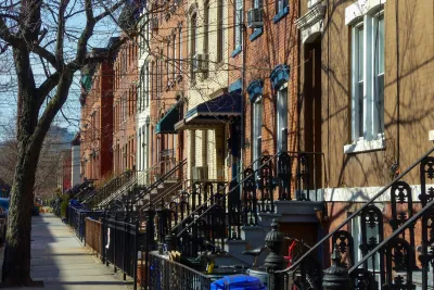 Row of brick walk-up residential buildings in New Jersey.