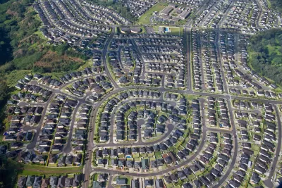 Aerial view of planned community with houses and winding streets in Pearl City, Oahu