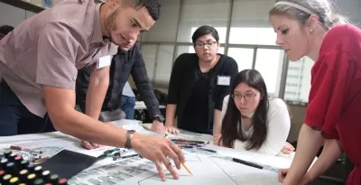 Image of students having a meeting