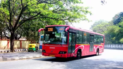 Red public transit bus in Bangalore, India.