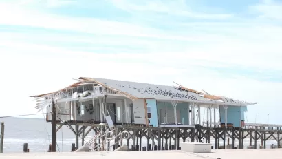 damaged building on pier in Gulf of Mexico in Galveston, Texas after Hurricane Ike.
