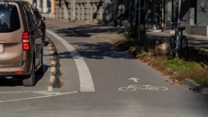Parking protected bike lane in Riga, Latvia.
