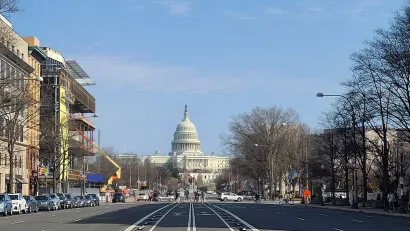 The Capitol dome in Washington, D.C. viewed from middle of Pennsylvania Avenue protected bike lanes.
