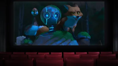 Screenshot of robot with fox and bird in The Wild Robot animated movie.