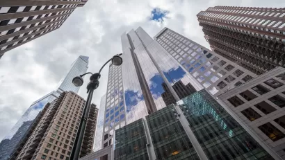 View up at high-rise buildings in Midtown Manhattan, New York City.