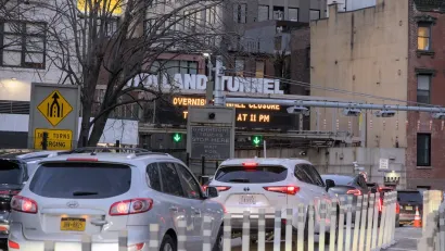Cars in traffic entering Holland Tunnel in New York City.