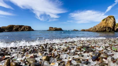 Close-up of rounded weathered multicolored glass pieces on Glass Beach in Fort Bragg, California.