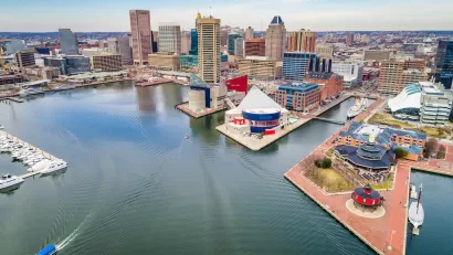 Aerial view of Baltimore's Inner Harbor with downtown skyline.